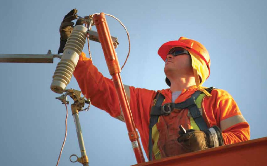 Worker working on electrical lines