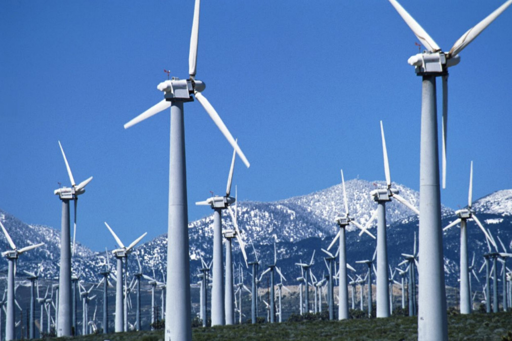 Wind farm with mountains in the background