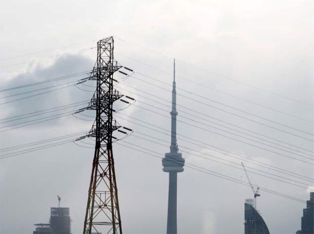 Power lines with the CN Tower in the background